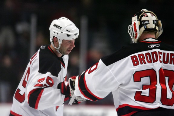 Grant Marshall celebrates a win with Martin Brodeur. (Jerry Lai-USA TODAY Sports)