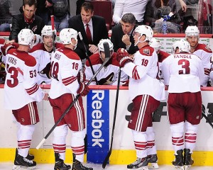 Phoenix Coyotes Head Coach Dave Tippett Confers With His Team During a Recent Road Game in Vancouver (Anne-Marie Sorvin-USA TODAY Sports)