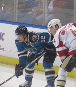 Defenseman Brendan Mikkelson takes a faceoff in a December matchup against the Worcester Sharks. (Alison Myers/THW)