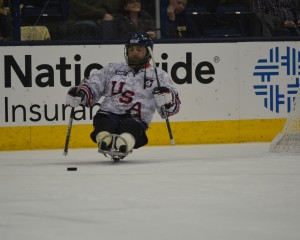 SSG Michael Cain takes the ice in Columbus. The USA Warriors participated in a shootout during the first intermission as the Jackets played the Capitals Thursday night. (USA Warriors: Ashleigh Bryant)