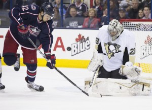 Marc-Andre Fleury handles pressure from Artem Anisimov (Greg Bartram-USA TODAY Sports)