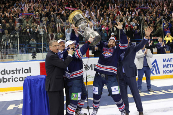 Sergey Mozyakin and Danis Zaripov hold Gagarin Cup after victory in the 2014 finals