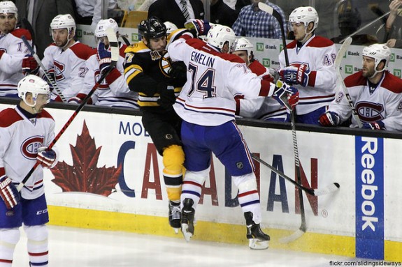 Milan Lucic checks Alexei Emelin (slidingsideways/Flickr)