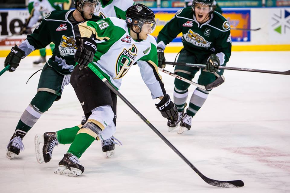 Leon Draisaitl of the Prince Albert Raiders passes the puck during