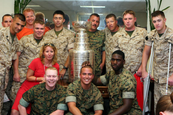 The Wesley's pose with the Stanley Cup. (via Josh Wesley)