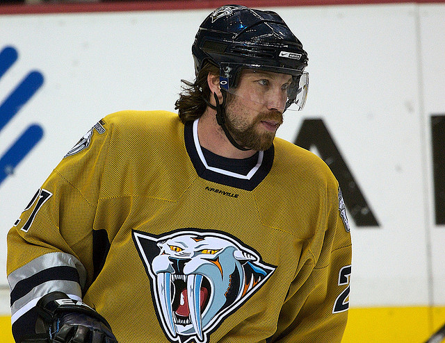 Nashville Predators forward Peter Forsberg (21) of Sweden skates past  teamate Paul Karyia (9) while playing against the Minnesota Wild in  Nashville, Tennessee on February 17, 2007. The visiting Wild won 4-1