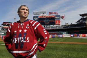 Alex Ovechkin models the sweater the Capitals will wear in the 2015 Winter Classic against the Chicago Blackhawks. (Geoff Burke-USA TODAY Sports)
