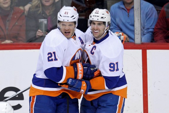 The top unit of Kyle Okposo and John Tavares celebrate a goal (Brace Hemmelgarn-USA TODAY Sports)