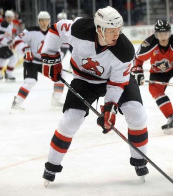 Seth Helgeson controls the puck during Albany's game against the Portland Pirates in 2013, at Times Union Center in Albany, N.Y. (Cindy Schultz / Times Union)