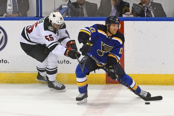 Oct 2, 2014; St. Louis, MO, USA; St. Louis Blues center Jaden Schwartz (17) passes the puck during the third period against the Minnesota Wild at Scottrade Center. The St. Louis Blues defeat the Minnesota Wild 4-1. (Jasen Vinlove-USA TODAY Sports)
