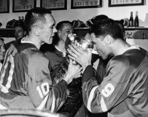 George Armstrong and Andy Bathgate sip from the Cup after winning it with the Leafs in 1964.