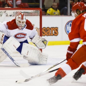 Darren Helm of the Detroit Red Wings shooting on Dustin Tokarski.