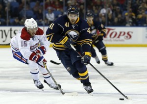 Montreal Canadiens forward P.A. Parenteau and Buffalo Sabres defenseman Andrej Meszaros