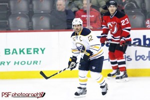 Brian Gionta skates against the New Jersey Devils (Paula Faerman Photography/paulafaermanphotography.org)