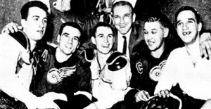 Wings celebrate - from the left: Ed Joyal, Norm Ullman, Paul Henderson, Sid Abel, Alex Delvecchio and Roger Crozier.