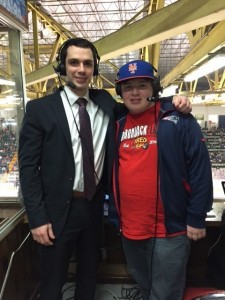 Cameron Close in the press box at the Glens Falls Civic Center.