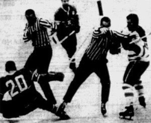 Dave Balon of Montreal falls to the ice after being clubbed by Leafs' Kent Douglas.