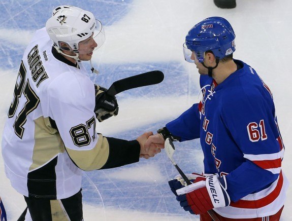Pittsburgh Penguins center Sidney Crosby (87) and New York Rangers left wing Rick Nash (61) shake hands after game five of the first round of the 2015 Stanley Cup Playoffs at Madison Square Garden. The Rangers defeated the Penguins 2 - 1 in overtime to advance to the next round.(Adam Hunger-USA TODAY Sports)