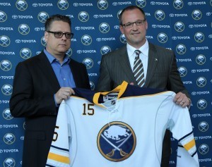 May 28, 2015; Buffalo, NY, USA; Buffalo Sabres general manager Tim Murray (left) and head coach Dan Bylsma hold a jersey at a press conference at the First Niagara Center. Mandatory Credit: Kevin Hoffman-USA TODAY Sports