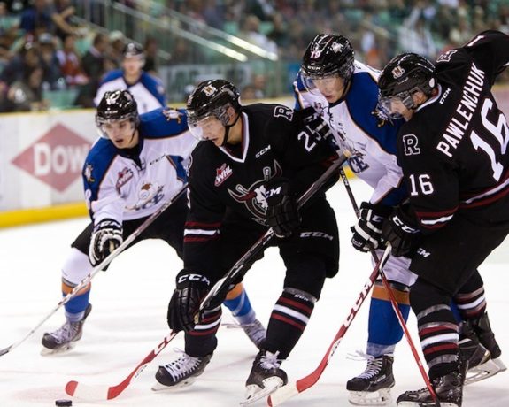 Adam Musil with Red Deer