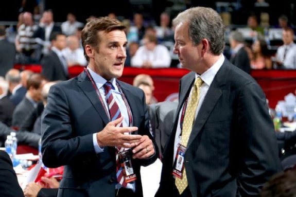 (THW file photo) George McPhee, left, can't yet make trades, but you can bet he's already holding court with his management peers, feeling them out on who might be available in the expansion draft.