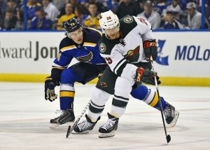 Jason Pominville fights off St. Louis Blues right wing T.J. Oshie during a game last April. The Wild won't have to deal with Oshie this season, but the Blues will still be a great opponent to watch. (Jasen Vinlove-USA TODAY Sports)