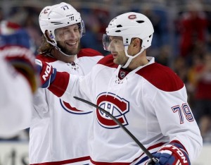 Montreal Canadiens defensemen Tom Gilbert and Andrei Markov