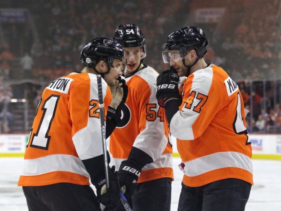 Andrew MacDonald #47, Oskar Lindblom #54 and Scott Laughton #21