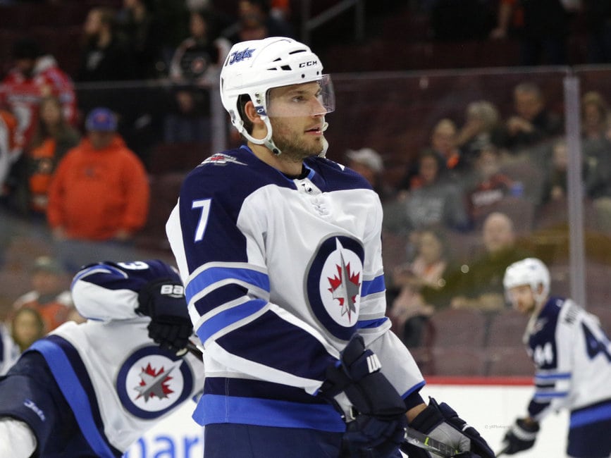 Jets Beat Capitals 3-1; University of Manitoba Coach is Backup Goalie