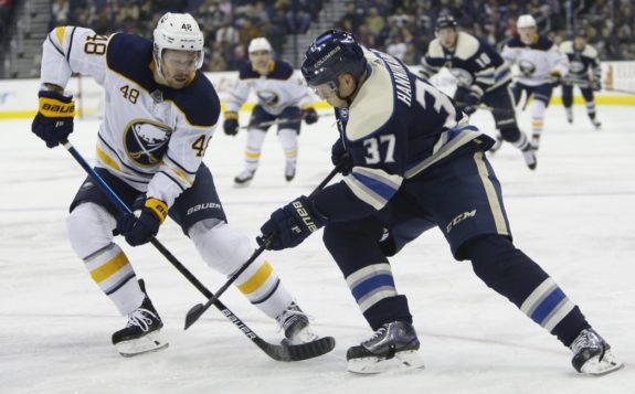 Buffalo Sabres' Matt Hunwick and Columbus Blue Jackets' Markus Hannikainen