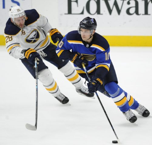 Buffalo Sabres' Zemgus Girgensons chases St. Louis Blues' Brayden Schenn