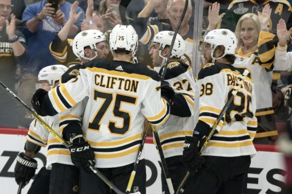 Boston Bruins Connor Clifton Matt Grzelcyk, Brad Marchand David Pastrnak