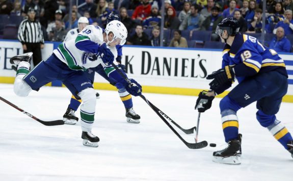 Vancouver Canucks' Elias Pettersson St. Louis Blues' Jay Bouwmeester