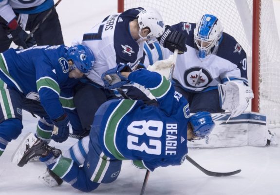 Winnipeg Jets Tyler Myers Laurent Brossoit Vancouver Canucks Jay Beagle