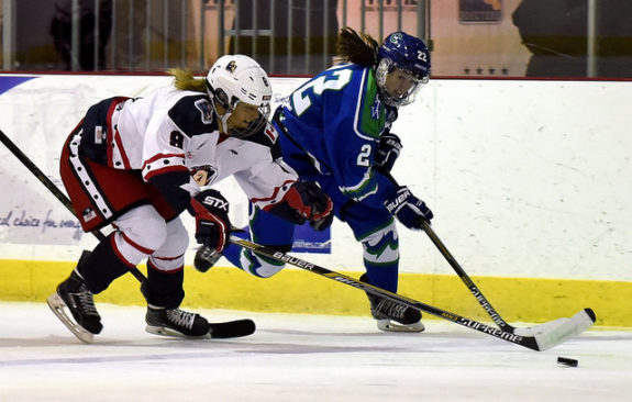 Danielle Ward of the Connecticut Whale and Sydney Kidd of the New York Riveters battle for a loose puck. (Photo Credit: Troy Parla)