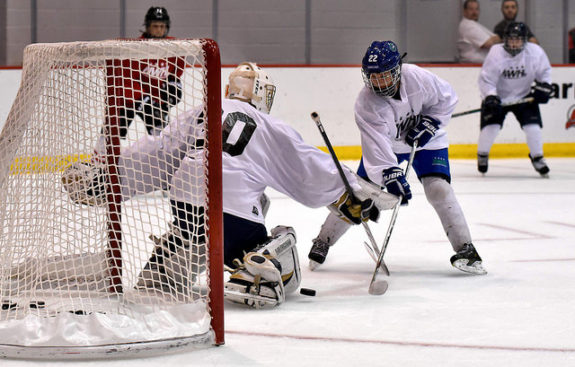 Danielle Ward attempts to score during the NWHL free agent camp in New Jersey. (Photo Credit: Troy Parla). 