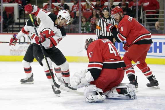 New Jersey Devils Kevin Rooney Carolina Hurricanes James Reimer Joel Edmundson