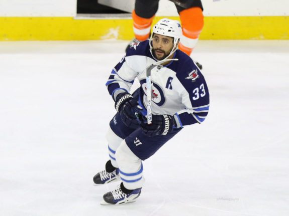 Atlanta Thrashers defenseman Mark Stuart (5) reacts while working