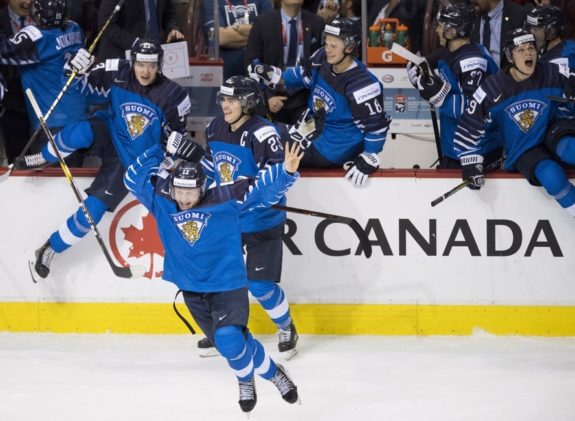 Finland bench celebrates gold