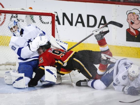 Tampa Bay Lightning's Erik Cernak Calgary Flames' Sam Bennett Louis Domingue