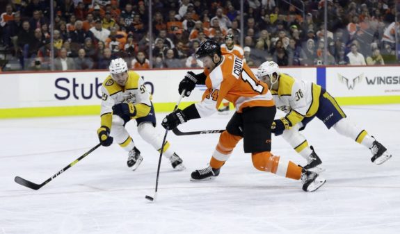 Philadelphia Flyers' Sean Couturier Nashville Predators' Ryan Hartman Roman Josi