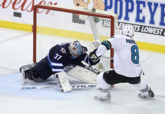 San Jose Sharks' Joe Pavelski Winnipeg Jets Connor Hellebuyck