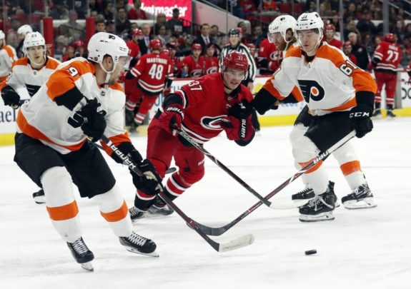 Philadelphia Flyers' Ivan Provorov Philippe Myers Carolina Hurricanes' Andrei Svechnikov