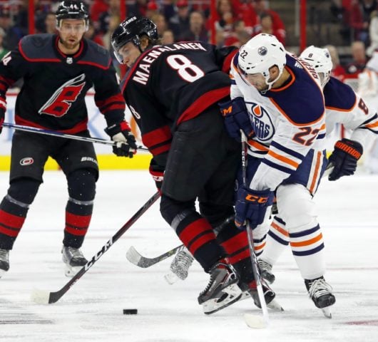 Carolina Hurricanes' Saku Maenalanen Edmonton Oilers' Tobias Rieder