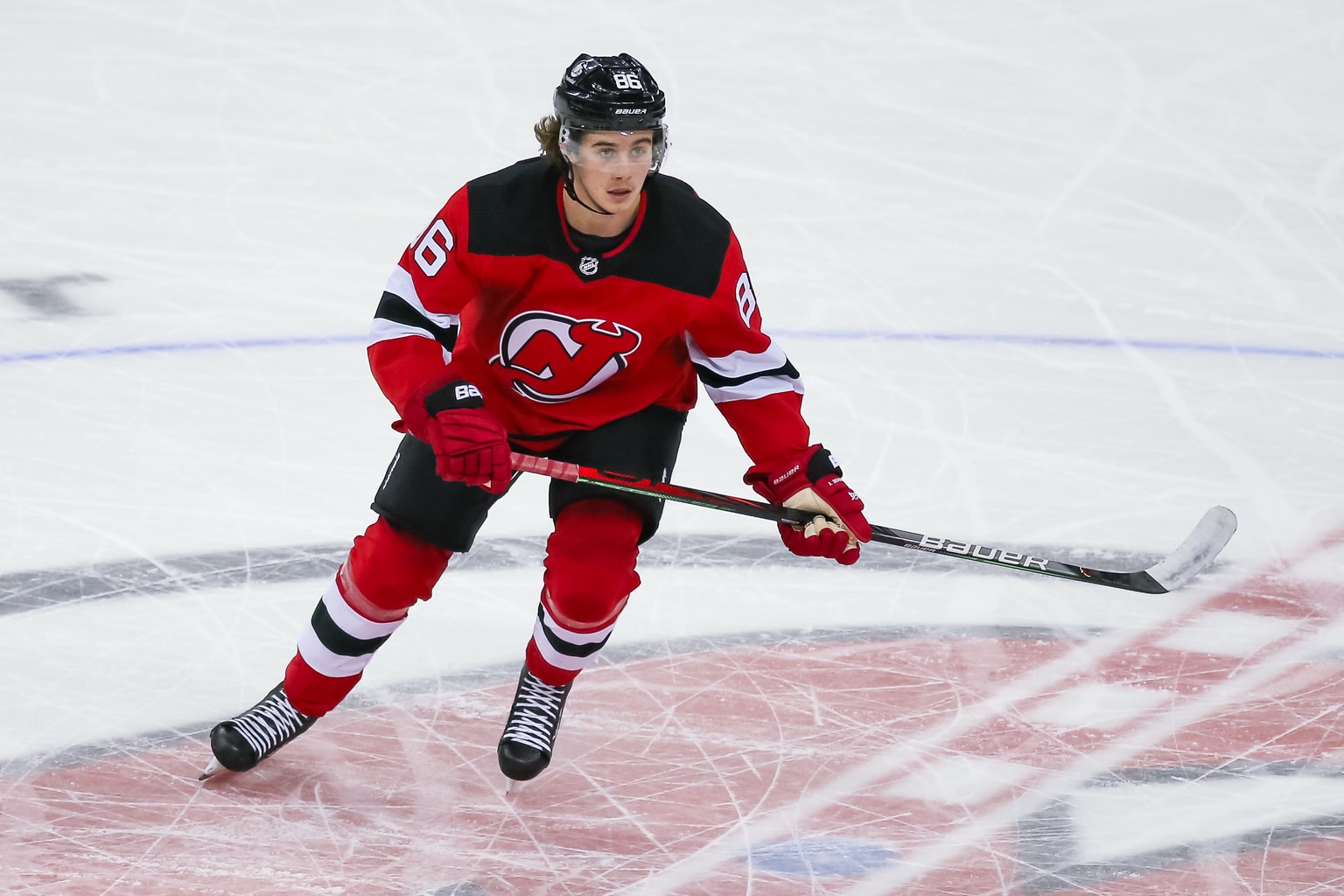 Hughes' 2 Goals Helps Devils Top Wings in Opener