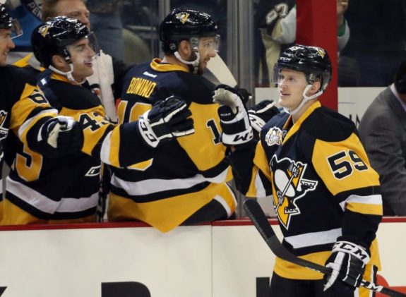 Jake Guentzel celebrating after a Penguins' goal