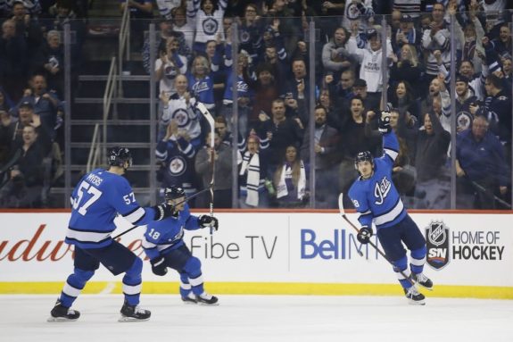 Winnipeg Jets' Tyler Myers Bryan Little Jack Roslovic