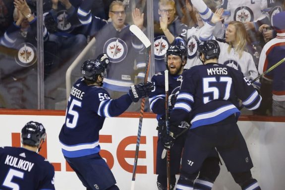 Winnipeg Jets' Blake Wheeler Tyler Myers Mark Scheifele