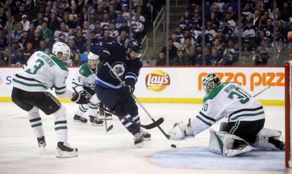 Winnipeg Jets' Adam Lowry Dallas Stars Ben Bishop