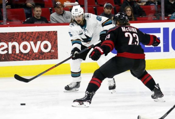 San Jose Sharks' Erik Karlsson Carolina Hurricanes' Brock McGinn